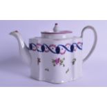 Late 18th c. New Hall style commode shaped teapot and cover painted with entwined blue and puce