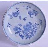 AN EARLY 18TH CENTURY CHINESE BLUE AND WHITE DISH Yongzheng, painted with floral sprays. 23 cm