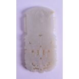 A GOOD CHINESE CARVED WHITE JADE ARCHAIC AMULET possibly Qianlong, with taotie mask head decoration.