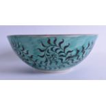 AN 18TH/19TH CENTURY JAPANESE EDO PERIOD GREEN GLAZED BOWL painted with floral sprays. 24 cm