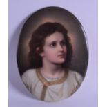 A LATE 19TH CENTURY CONTINENTAL PAINTED PORCELAIN PLAQUE depicting a young girl wearing a white