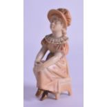 Royal Worcester uncommon Kate Greenaway figure of a girl seated on a stool with her hands in her