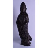 A LARGE CHINESE QING DYNASTY CARVED BAMBOO FIGURE OF GUANYIN modelled holding prayer beads,