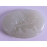 A CHINESE CARVED GREENISH WHITE JADE PEBBLE decorated with figures upon a boat, the reverse with a