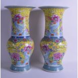 A RARE PAIR OF 19TH CENTURY CHINESE FAMILLE JAUNE YEN YEN VASES painted with floral sprays and birds