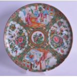 A 19TH CENTURY CHINESE CANTON FAMILLE ROSE PORCELAIN DISH painted with figures, birds and foliage.