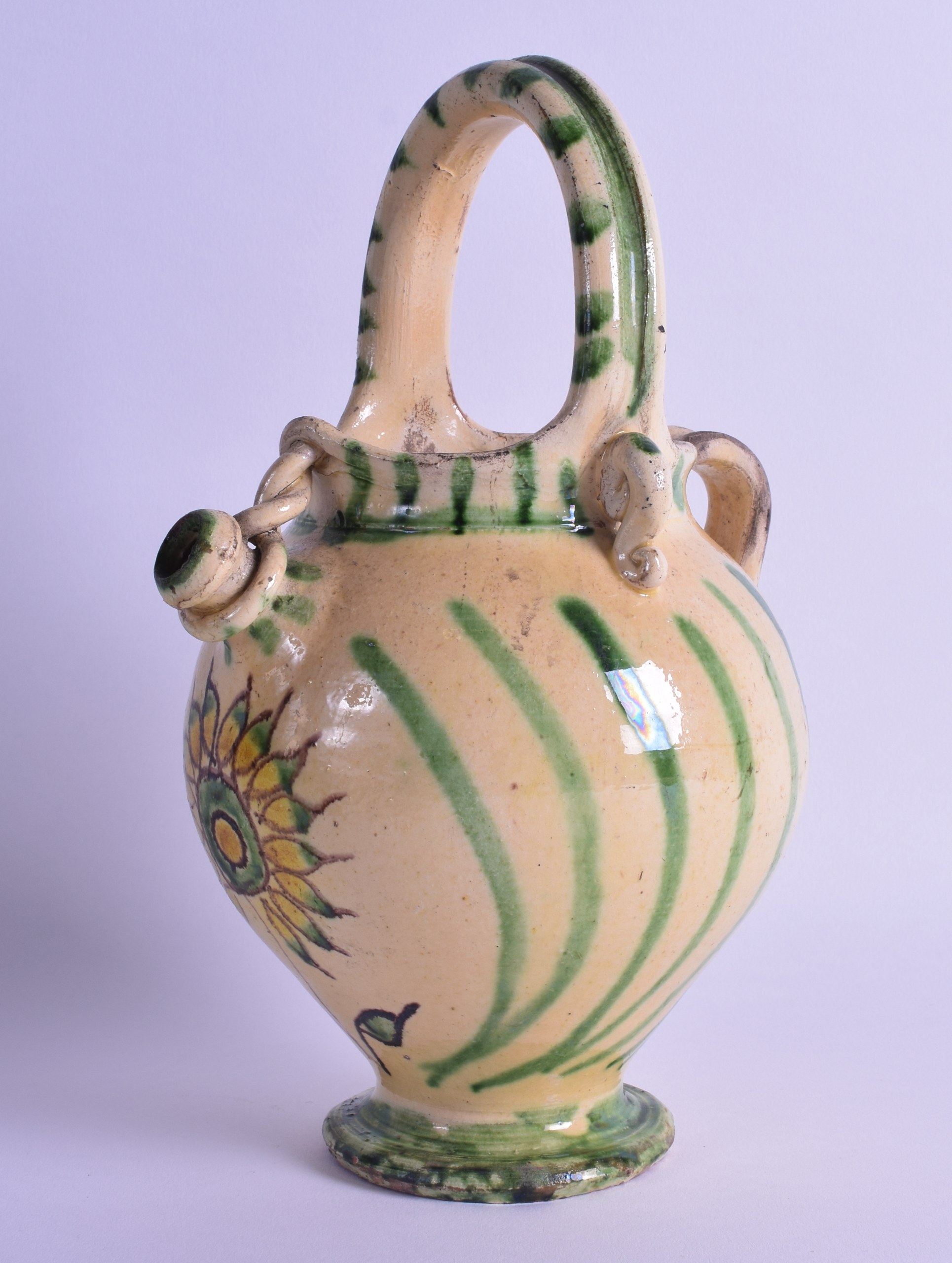AN EARLY 20TH CENTURY CONTINENTAL MAJOLICA STYLE BASKET JUG painted with floral sprays. 25.5 cm
