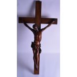 A LARGE 19TH CENTURY CARVED CONTINENTAL WOOD CORPUS CHRISTI modelled upon a crucifix. 101 cm x 52