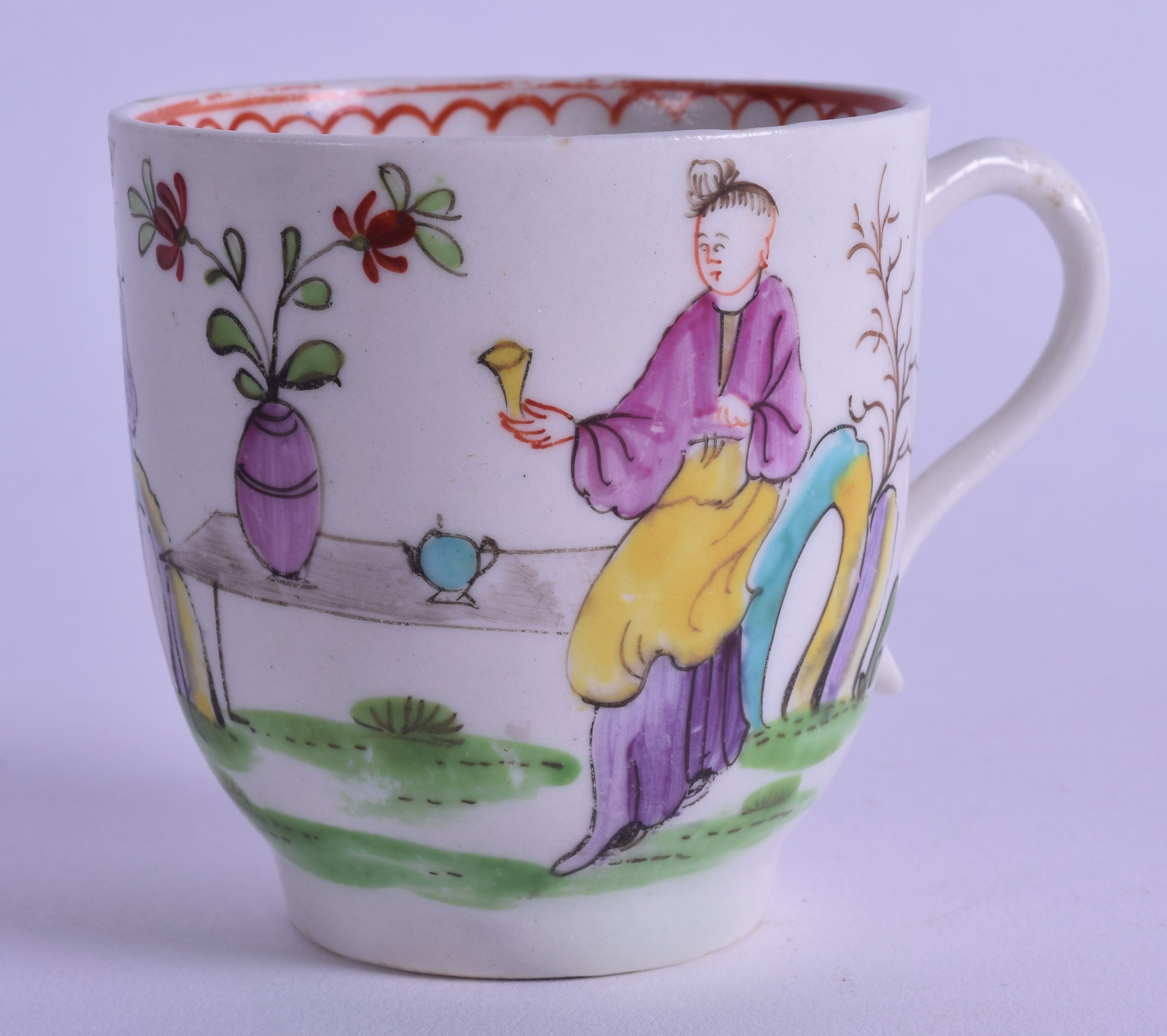 18th c. Lowestoft early coffee cup painted with two oriental ladies and a bird in a tree.