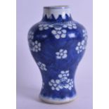 A 17TH CENTURY CHINESE BLUE AND WHITE BALUSTER VASE Kangxi, painted with floral sprays. 14.5 cm