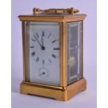 A LATE 19TH CENTURY FRENCH BRASS CARRIAGE CLOCK with white enamel dial and black numerals. 16.5 cm