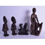 A PAIR OF AFRICAN TRIBAL CARVED FERTILITY FIGURES together with three others. Largest 42 cm high. (