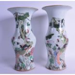 A PAIR OF 19TH CENTURY CHINESE FAMILLE ROSE YEN YEN VASES Tongzhi, painted with birds and hollow