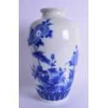 A 19TH CENTURY JAPANESE MEIJI PERIOD BLUE AND WHITE PORCELAIN VASE painted with extensive floral