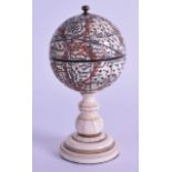 A LATE 19TH CENTURY CONTINENTAL CARVED IVORY GLOBE ON STAND with rising top revealing an engraving