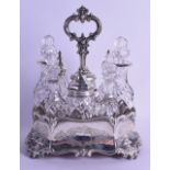 A VICTORIAN SILVER AND GLASS EIGHT BOTTLE CRUET SET by John Angell II & George Angel. London 1845.