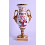 AN EARLY 19TH CENTURY COALPORT TWIN HANDLED PORCELAIN VASE painted with a vase of flowers. 21.5 cm
