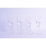 Four 20th c. lead crystal wine glasses weighing over 320 grams/11.3 oz. 17cm high