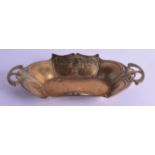 AN ART NOUVEAU TWIN HANDLED WMF BRASS DISH decorated with stylised foliage. 30 cm wide.