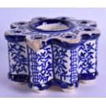 A LATE 19TH CENTURY MIDDLE EASTERN IZNIK STYLE INKWELL painted with stylised flowers. 11.5 cm wide.