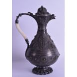 A FINE 18TH/19TH CENTURY PERSIAN/OTTOMAN SILVER EWER with scrolling ivory handle, decorated with