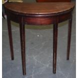 A GEORGIAN MAHOGANY DEMI LUNE CARD TABLE, of plain form. 66 cm wide.