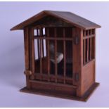 A RARE EARLY 20TH CENTURY AMERICAN SQUAWK BOX modelled as a chicken coop. 17 cm wide.