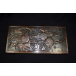 A VINTAGE COPPER PANEL, depicting swimming fish. 55 cm x 25 cm.