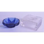 A FRENCH LALIQUE GLASS BOX AND COVER together with a blue lalique glass bowl. Both 10 cm wide. (2)