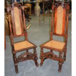 A PAIR OF QUEEN ANNE STYLE OAK CHAIRS, with cane work back & seat. 124 cm high.