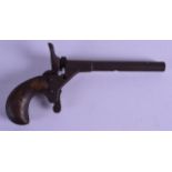 AN UNUSUAL EARLY 19TH CENTURY FLINTLOCK PISTOL with carved wood grip. 14.5 cm wide.