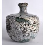 A Persian Knobbled Glass Vase, 9th/10th Century. 5.75ins high.