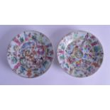 A RARE PAIR OF 19TH CENTURY CHINESE CANTON FAMILLE ROSE PLATES painted with figures and dragons