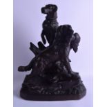 A FINE LARGE 19TH CENTURY BLACK FOREST CARVED GROUP OF TWO HOUNDS modelled with game within there