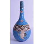 A LATE 19TH CENTURY JAPANESE MEIJI PERIOD BULBOUS VASE imitating cloisonne, painted with a bird in
