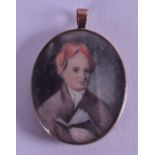 AN EARLY 19TH CENTURY PAINTED PORTRAIT IVORY MINIATURE within a yellow metal frame. 3.25 cm x 4 cm.