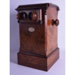 A GOOD VICTORIAN BURR WALNUT STEREOSCOPE with automatic adjusting, set with numerous European