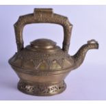 A LATE 19TH CENTURY INDIAN BRASS TEAPOT AND COVER decorated in relief with scrolling floral vines