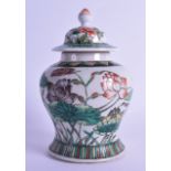 A LATE 19TH CENTURY CHINESE FAMILLE VERTE BALUSTER GINGER JAR AND COVER Kangxi style, painted with