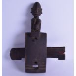 A 19TH CENTURY AFRICAN CARVED HARDWOOD DOOR LOCK of figural form, modelled as a female with her