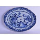 A LARGE 18TH CENTURY CHINESE EXPORT BLUE AND WHITE OVAL DISH Qianlong, painted with two birds within