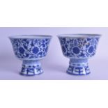 A GOOD NEAR PAIR OF CHINESE QING DYNASTY BLUE AND WHITE STEM CUPS Qianlong mark and possibly of