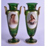 A PAIR OF LATE 19TH CENTURY BOHEMIAN GREEN TWIN HANDLED VASES enamelled with portraits of pretty