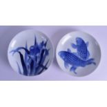 A 19TH CENTURY JAPANESE MEIJI PERIOD BLUE AND WHITE NABESHIMA KOI CARP DISH together with another.