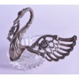 A SILVER AND CUT GLASS SWAN DISH with extending wings. 11 cm long.