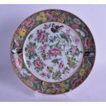 A MID 19TH CENTURY CHINESE CANTON FAMILLE ROSE DISH painted with butterflies and birds. 21 cm