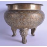 A LARGE 19TH CENTURY INDIAN ENGRAVED BRASS CENSER decorated all over with scrolling vines and