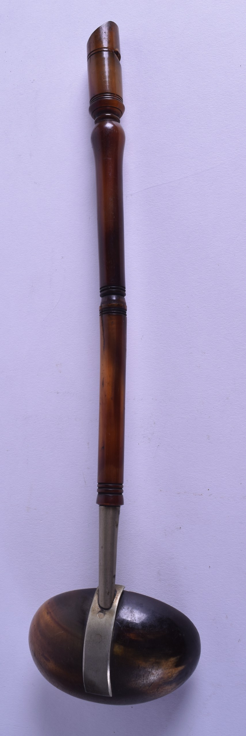 AN UNUSUAL 19TH CENTURY CARVED HORN WHISTLE LADLE with white metal mounts. 32.5 cm long. - Image 2 of 2