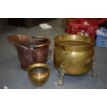 A LARGE COPPER COAL SCUTTLE, together with brass vase and another. (3)