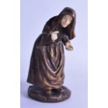 A LATE 19TH CENTURY CONTINENTAL BRONZE AND IVORY FIGURE OF A FEMALE modelled as an elderly lady upon